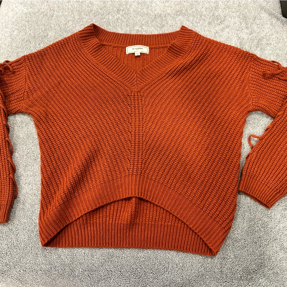 Sleeve detail, cropped v-neck sweater